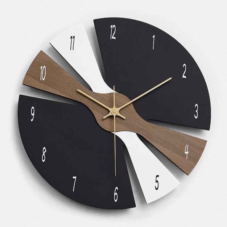 Modern luxury wooden wall clock for living room decor in Pakistan, featuring a 3D geometric propeller design in matte black and walnut wood.